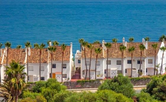 Unlocking the Potential: The Pros and Cons of Buying Real Estate in Spain
